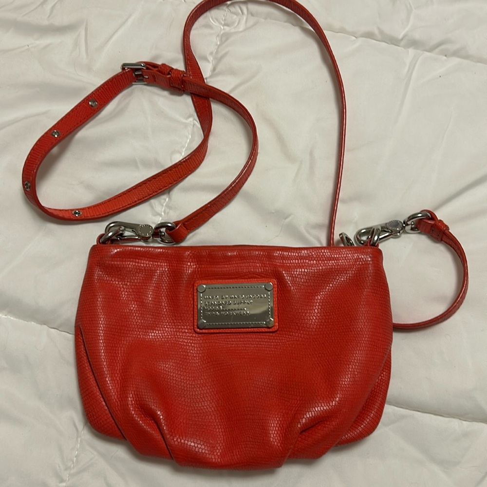 Marc Jacob’s signature crossbody red/orange purse